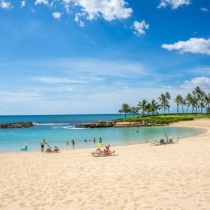 People sunbathing on Hawaii beach